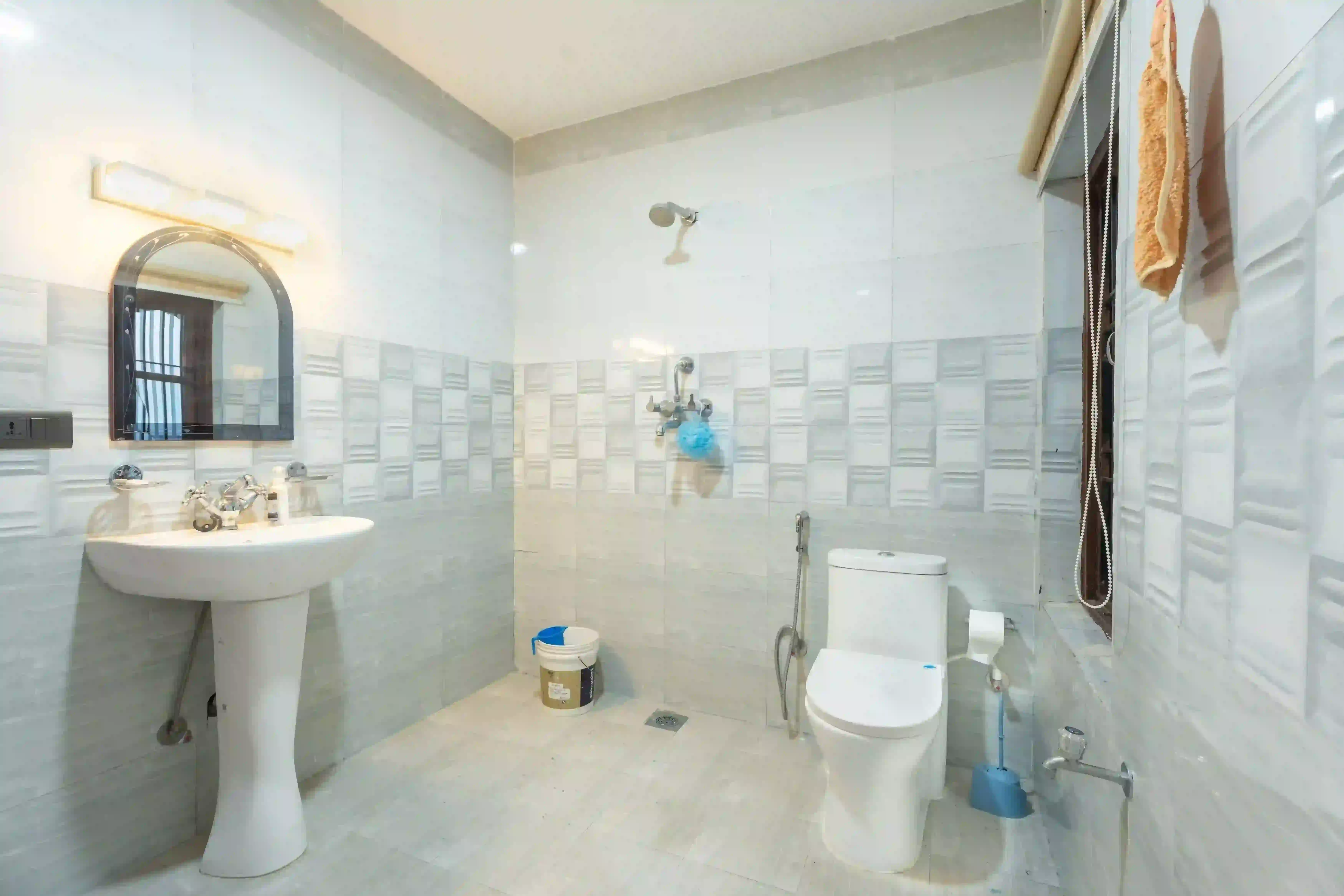 Private attached bathroom in the master bedroom at Aananda Homestay